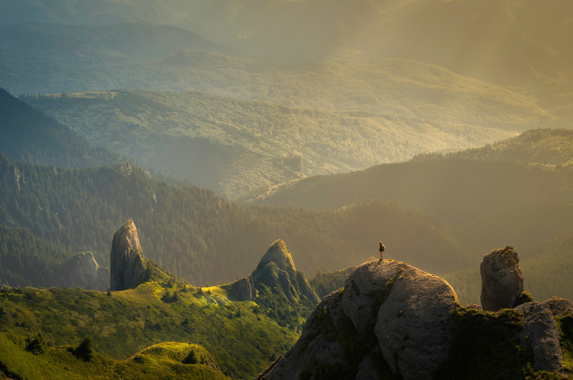 Sunlight breaking over a mountain landscape